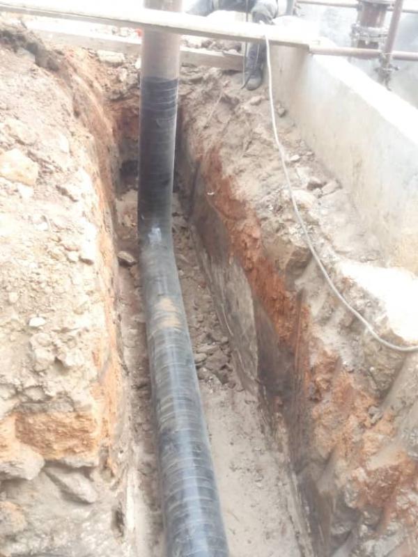 Installation tuyauterie souterraine d'évacuation d'eaux pluvial à CIMAF Abidjan